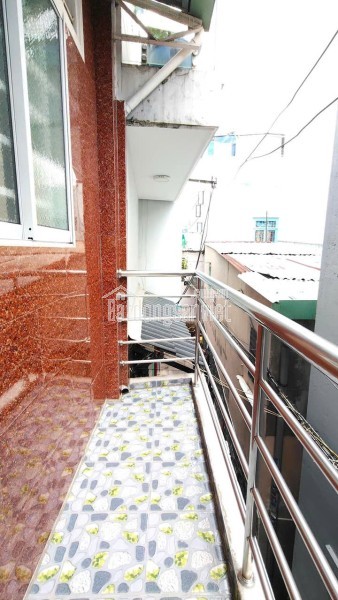 Bán nhà mặt phố Lê Quang Sung, Q.6. DT 42m2, 2 tầng, 3PN. Sổ hồng, giá 6.5 tỷ.