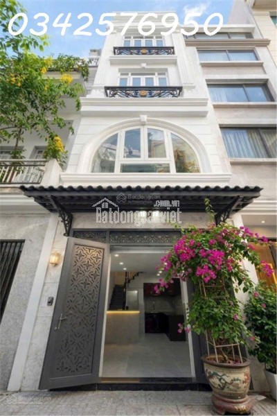 Bán nhà 2 tầng 21m² Nguyễn Thần Hiến, Q.4, 5.6 tỷ, sổ đỏ.