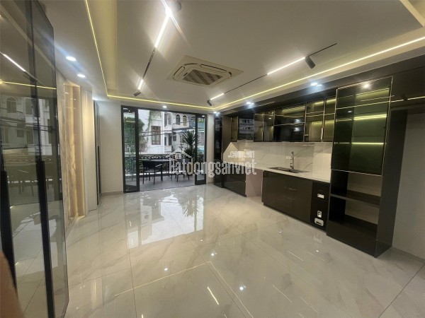 Siêu phẩm nhà đẹp mặt đường Đông Trà 5 tầng thang máy ô tô đỗ cửa kinhdoanh buôn bán tốt