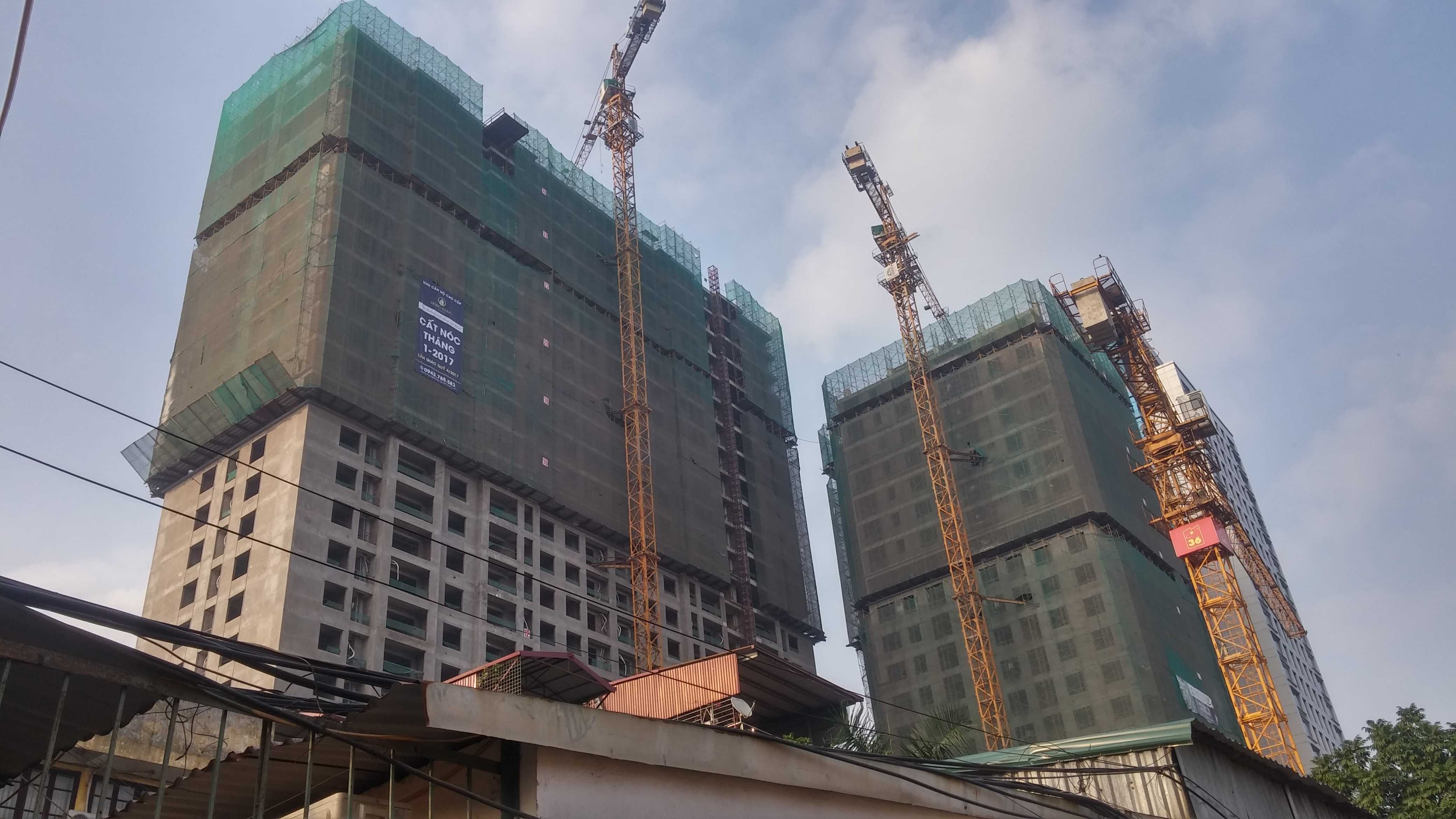 Tháp A đã hoàn thiện và chuẩn bị cất nóc, tháp B đang thi công tới mặt sàn tầng 23